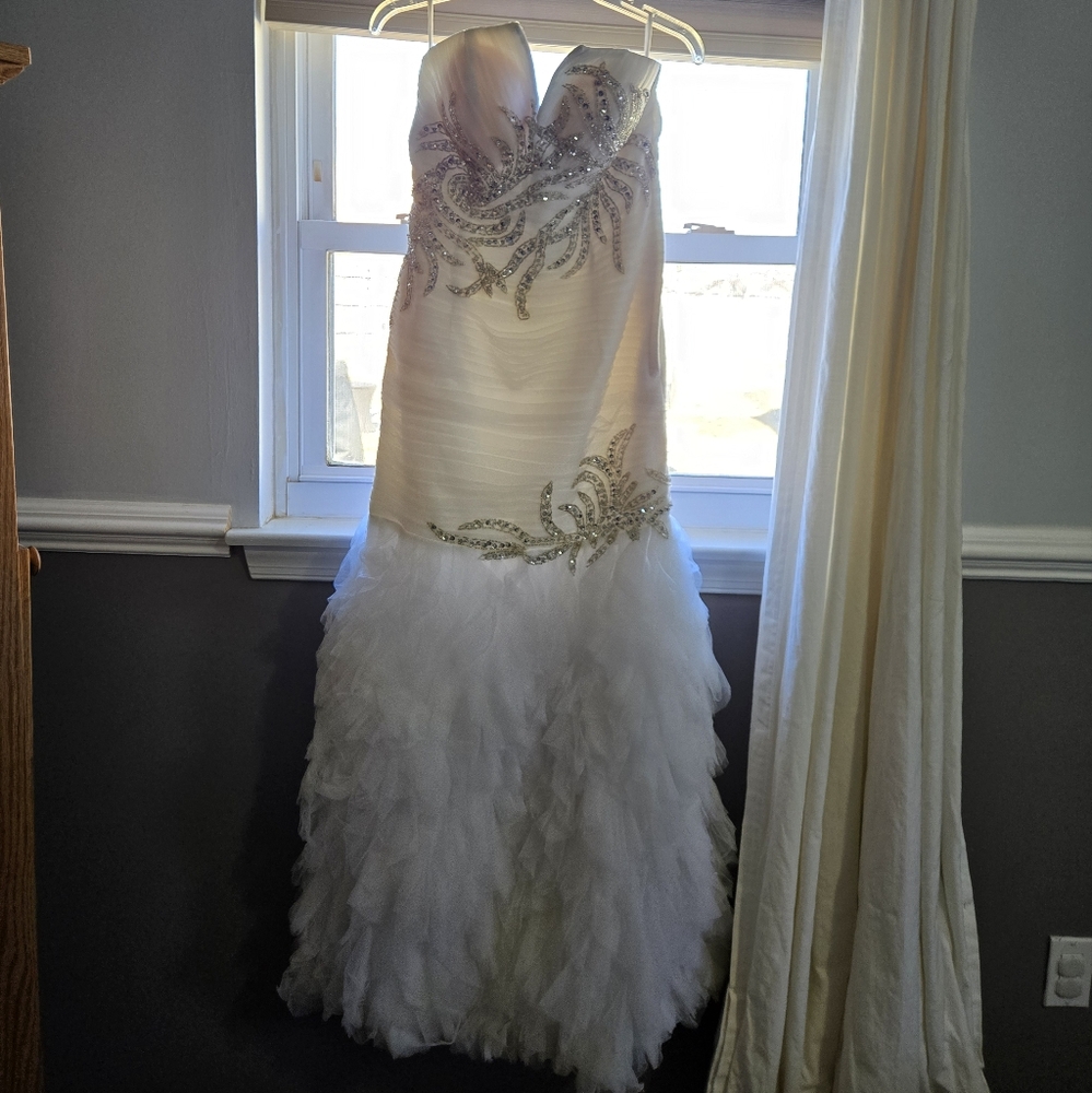 Elegant White Strapless Gown with Silver Embellishments